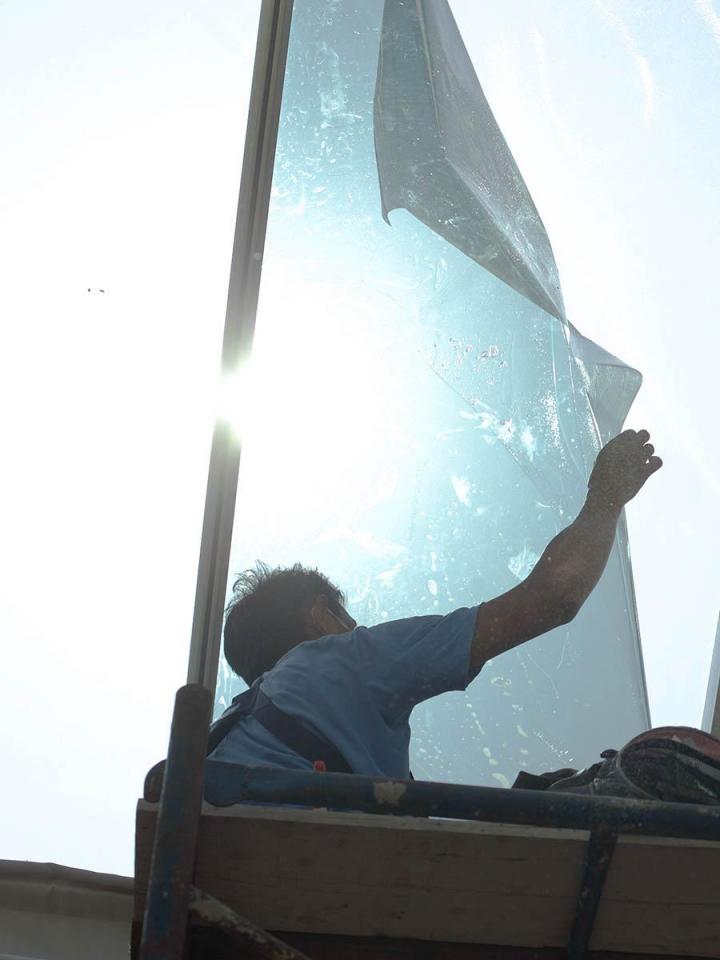 Pose de film protection solaire sur vitrage Calvados